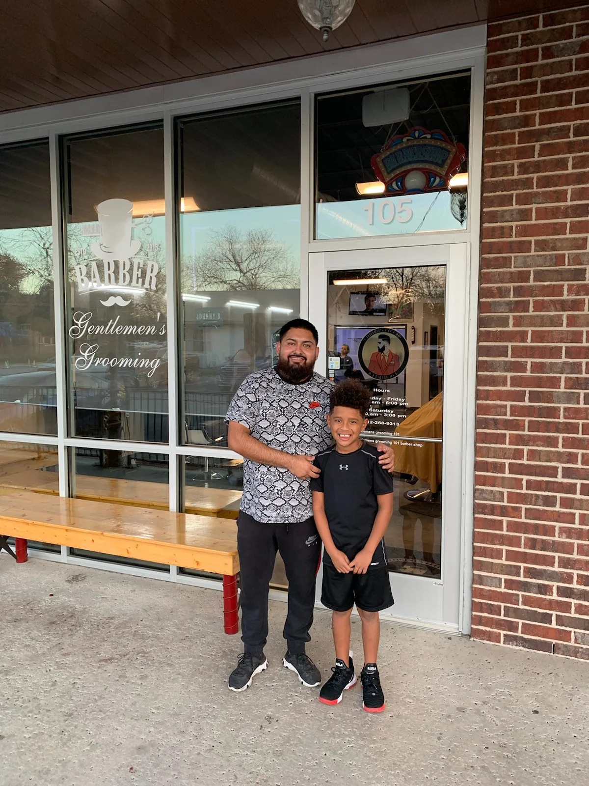 Photo with a kid that just received a haircut at GG101