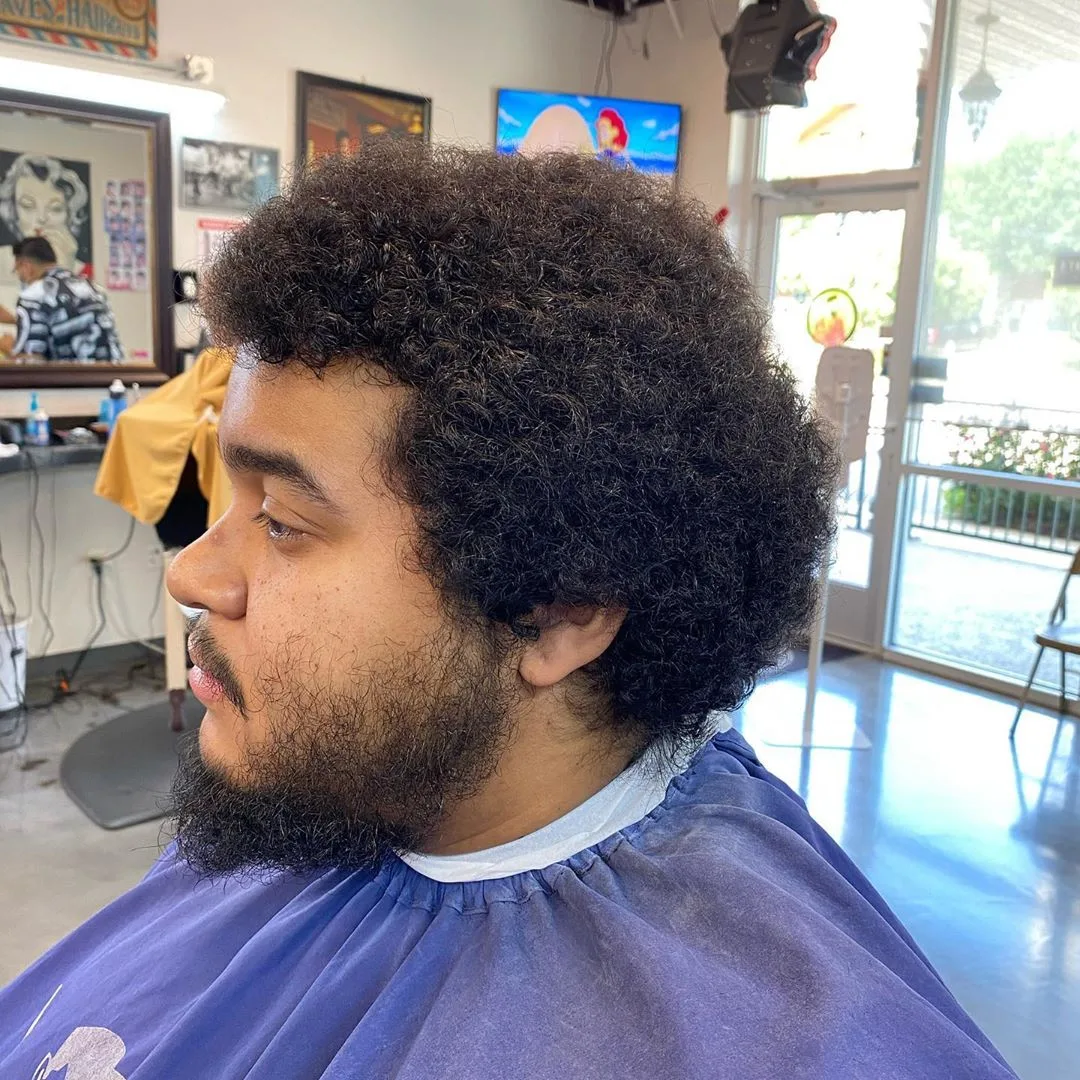 Pre transformation haircut for a patron. Local service for a patron of the community.